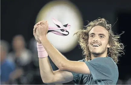  ?? /GETTY IMAGES / FRED LEE ?? Stefanos Tsitsipas celebrates his victory against Roger Federer during their men's singles match on day seven of the Australian Open tennis tournament in Melbourne.