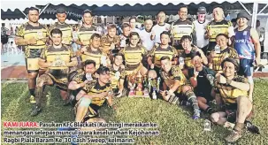  ??  ?? KAMI JUARA: Pasukan KFC Blackats (Kuching) meraikan kemenangan selepas muncul juara keseluruha­n Kejohanan Ragbi Piala Baram Ke-30 Cash Sweep, kelmarin.