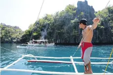  ?? GLEN PETRIE ?? Island hopping in Bacuit Bay, El Nido, Palawan.