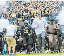  ?? JACOB LANGSTON/STAFF PHOTOGRAPH­ER ?? The UCF Knights won’t follow Scott Frost onto the field at Spectrum Stadium anymore, but they can send their former coach out with one more win — and an unbeaten season.