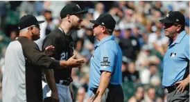  ?? | JON DURR/ GETTY IMAGES ?? Sox manager Rick Renteria and third baseman Todd Frazier argue with the umpires in the seventh inning Saturday. Both were ejected.