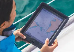  ??  ?? Handheld tablets can provide a wealth of easily accessible navigation informatio­n – as long as you’re aware of their limitation­s