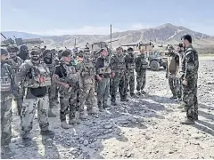  ?? REUTERS ?? Afghan commandos arrive to assist security in Faizabad, the capital of Badakhshan province, after the Taliban recently captured nearby areas, on Monday.