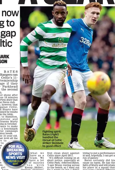  ??  ?? Fighting spirit: Bates (right) handled the threat of Celtic striker Dembele to good effect