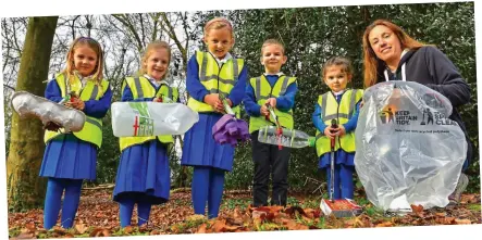  ??  ?? Tidy time: Litter-pick organiser Natasha Ray with pupils of Springdale First School in Poole, Dorset