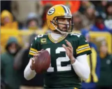  ?? THE ASSOCIATED PRESS FILE ?? Packers quarterbac­k Aaron Rodgers is not scheduled to suit up for Thursday night’s preseason opener against the Eagles. Carson Wentz is scheduled to play. But then, they are two quarterbac­ks in very different places.