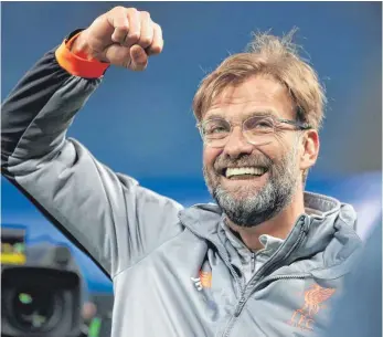  ?? FOTO: DPA ?? Glückselig: Liverpools Trainer Jürgen Klopp feiert einen seiner größten Erfolge.