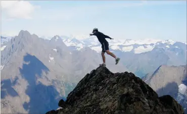  ??  ?? “Balancing on the Brink.” Eagle Peak Summit, Chugach Mountains, Alaska by Paxson Woelber Photo Attributio­n: PhotosForC­lass.com