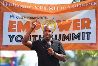  ?? CHRIS RILEY — TIMES-HERALD ?? Former San Francisco Giant Barry Bonds talks to eighth graders from Vallejo schools during the Empower Youth Summit at Six Flags Discovery Kingdom put on by Kaiser Permanente on Tuesday. ‘Even though in 22years, I never won a World Series ring,’ Bonds said. ‘I’m still a winner.’