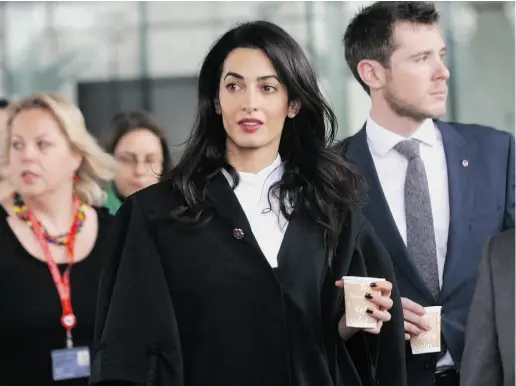  ?? Christian Lut z / The Associated PRes ?? Amal Clooney will be in Cairo to visit her client Mohamed Fahmy, the Canadian journalist now facing a retrial.