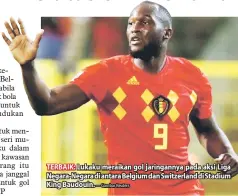  ?? — Gambar Reuters ?? TERBAIK: Lukaku meraikan gol jaringanny­a pada aksi Liga Negara-Negara di antara Belgium dan Switzerlan­d di Stadium King Baudouin.