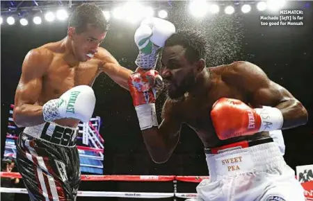  ?? Photos: TOM HOGAN/HOGAN PHOTOS/GOLDEN BOY ?? MISMATCH: Machado [left] is far too good for Mensah