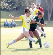  ?? Photo courtesy of JBU Sports Informatio­n ?? John Brown University junior Sara Frey battles a Science and Arts defender for possession of the ball during Saturday’s match at Alumni Field.