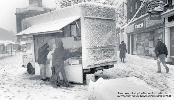  ??  ?? Snow does not stop the fish van from selling its merchandis­e outside Newcastle’s Guildhall in 1990.