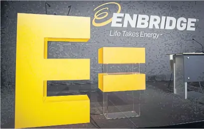  ?? JEFF MCINTOSH THE CANADIAN PRESS ?? Enbridge Inc. says it lost $90 million in its latest quarter as it was hit by a number of one-time charges.