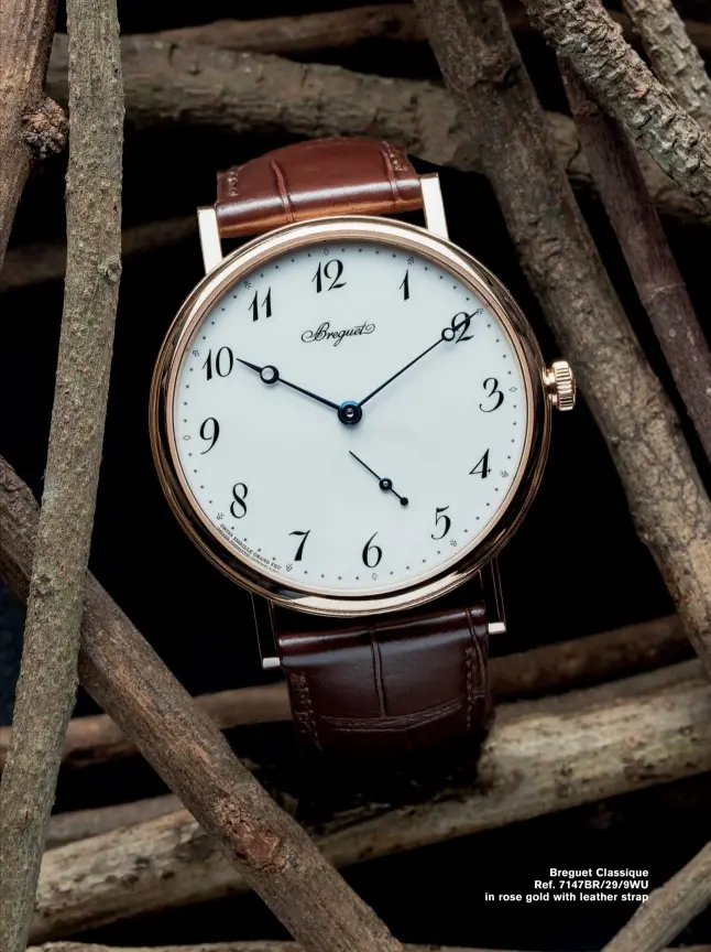  ??  ?? 99 Breguet Classique Ref. 7147BR/29/9WU in rose gold with leather strap