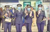  ?? PTI ?? The all-women crew of the inaugural flight of Air India at Kempegowda Internatio­nal Airport in Bengaluru on Monday.