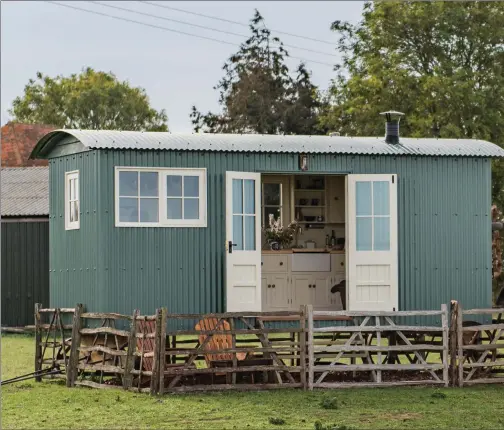  ??  ?? The rustic Romney Marsh Shepherds Huts are fully kitted out with hot water and electric: there’s a small kitchen area with a hob, sink and fridge, bathroom, and super-comfy double bed