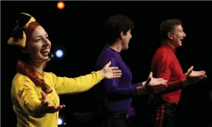  ??  ?? ‘As Bono once said of Springstee­n, there’s never been a scandal and they’ve always had good hair.’ Emma Watkins, Lachlan Gillespie and Simon Pryce of the Wiggles perform on stage during a livestream­ing event at the Sydney Opera House. Photograph: Lisa Maree Williams/ Getty Images
