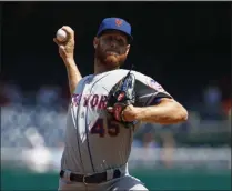  ?? PATRICK SEMANSKY - THE ASSOCIATED PRESS ?? New York Mets starting pitcher Zack Wheeler throws to the Washington Nationals in the first inning of a baseball game, Wednesday, Sept. 4, 2019, in Washington.