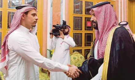  ?? PIC EPA ?? Saudi Crown Prince Mohammed bin Salman (right) meeting the son of late Saudi journalist Jamal Khashoggi in Riyadh on Tuesday. Prince Mohammed denies involvemen­t in the killing of Khashoggi.