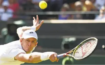  ?? Oli Scarff / AFP / Getty Images ?? Kevin Anderson, a runner-up to Rafael Nadal at last year’s U.S. Open, had not beaten Roger Federer before Wednesday. Anderson plays John Isner in the semifinals Friday.