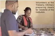  ??  ?? Volunteers at the Trelawny Infirmary preparing meals for residents of the institutio­n. AT TOP: A member of the Jamaica Constabula­ry Force volunteeri­ng her time to feed a disabled man at the Trelawny Infirmary.