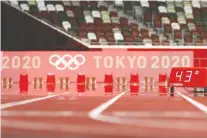  ?? RYAN PIERSE/GETTY IMAGES ?? The temperatur­e inside Olympic Stadium, according to the readout, hit 43C Monday after the morning session.