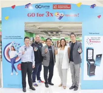  ?? PHOTOGRAPH COURTESY OF GOTYME ?? CELEBRATIN­G the Robinsons, GoTyme collaborat­ion are (from left) Stanley Co, managing director of the Supermarke­t Segment of Robinsons; Eelan Reyes, head of sales at GoTyme Bank; Jojo Malolos, president of GoTyme Bank ; Cesca Cruz, Go Rewards Director for Growth Marketing; and Aaron Foo, chief strategy officer at GoTyme Bank.