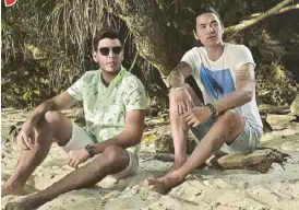  ??  ?? Model Marco Poli (left) and Sky Yang (model and former Star Magic talent) wearing NATO Strap