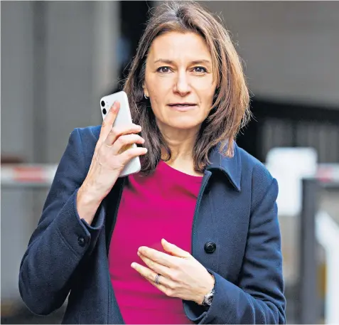  ?? ?? Lucy Frazer, the Culture Secretary, leaves the Interconti­nental Park Lane hotel in London yesterday after the Conservati­ve Friends of Israel’s annual business lunch