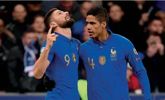  ??  ?? Key men…Varane and Olivier Giroud celebratin­g during Euro 2020 qualifying