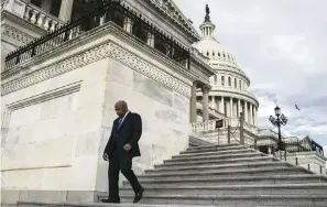  ?? AL DRAGO NYT ?? U.S. Rep. John Lewis departs Capitol Hill after morning votes in Washington in 2017.