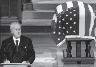  ?? CP PHOTO ?? Former Canadian Prime Minister Brian Mulroney speaks during the state funeral for former President George H.W. Bush at the National Cathedral, Wednesday, in Washington.