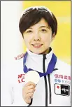  ?? (AP) ?? First-place finisher Japan’s Nao Kodaira holds her medal following the women’s 500 meters during the world single distances speedskati­ng championsh­ips on Feb 14, in
Kearns, Utah.