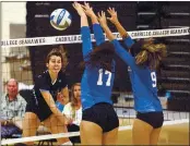  ?? DAN COYRO – SANTA CRUZ SENTINEL FILE ?? Cabrillo College volleyball player Cierra Verdone tries to get her shot past two San Mateo defenders in a 2019 match.