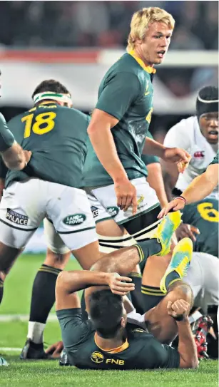  ??  ?? On the front foot: Faf de Klerk breaks through England’s lines at Ellis Park