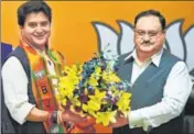  ?? RAJ K RAJ/HT PHOTO ?? ■ Former Congress leader Jyotiradit­ya Scindia with BJP president JP Nadda at BJP HQs in New Delhi on Wednesday.