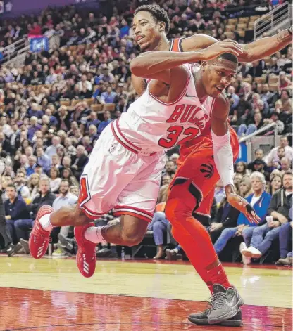  ?? | AP ?? Guard Kris Dunn ( shown being fouled by the Raptors’ DeMar DeRozan) says he is working on taking better care of the ball.