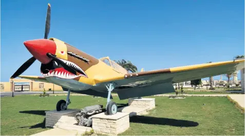  ??  ?? The RAF P40 Kittyhawk on display at El Alamein Military Museum near Alexandria in Egypt. British historians have spoken of their disgust at the plane’s ‘hideous’ makeover