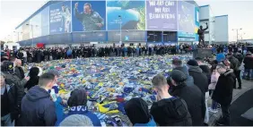  ?? GARETH EVERETT ?? Flowers and tributes to Emiliano Sala continue to grow in numbers outside Cardiff City Stadium ahead of the match against Bournemout­h