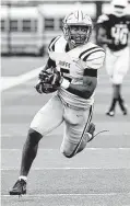  ?? Craig Moseley / Staff photograph­er ?? Fort Bend Marshall star Devon Achane is a multiple threat.