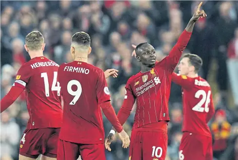  ?? REUTERS ?? Liverpool’s Sadio Mane, No.10, celebrates scoring against Wolves at Anfield.
