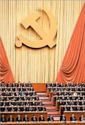  ?? LINTAO ZHANG/GETTY ?? The Communist Party of China has elevated President Xi Jinping to a level held by Mao Zedong and Deng Xiaoping.