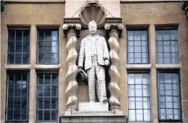  ??  ?? A STATUE of British colonialis­t Cecil Rhodes is seen on the side of Oriel College in Oxford. No statue should ever stand over citizens of a free country other than by their continued consent, says the writer. | Reuters