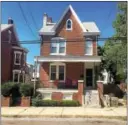  ?? PHOTO PROVIDED BY MICHAEL T. SNYDER ?? George and Margaret Wausnock lived in this single brick home on Evans Street.