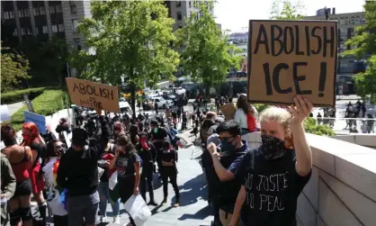  ??  ?? Protesters rally against Ice outside City Hall in Seattle. Human rights advocates says there has been a significan­t accelerati­on of deportatio­ns linked to the possibilit­y that Ice could soon be under new management. Photograph: Karen Ducey/Getty Images