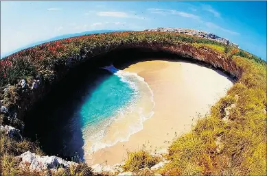  ?? — VALLARTA ADVENTURES FILES ?? An aerial view of Hidden Beach. The tide determines entrance.