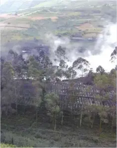  ??  ?? DIENG: Smoke billows from Sileri Crater after it erupted in Dieng, Central Java, Indonesia on Sunday, July 2, 2017. A helicopter carrying eight people crashed while on the way to help with evacuation­s near a volcano that erupted on the main Indonesian...