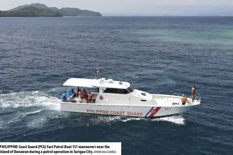  ?? ERWIN MASCARIÑAS ?? PHILIPPINE Coast Guard (PCG) Fast Patrol Boat 151 maneuvers near the island of Danawan during a patrol operation in Surigao City.